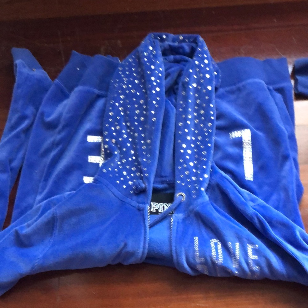 Two Victoria secret zip ups